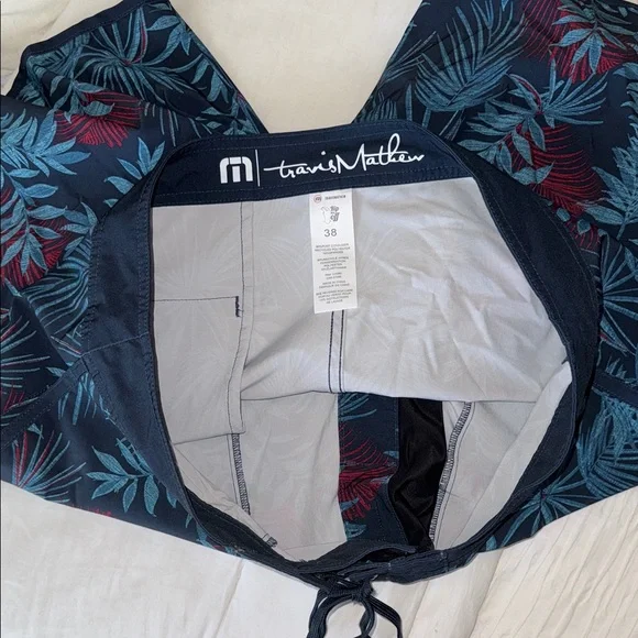 Travis Mathew Navy and Red Tropical Print Board Shorts